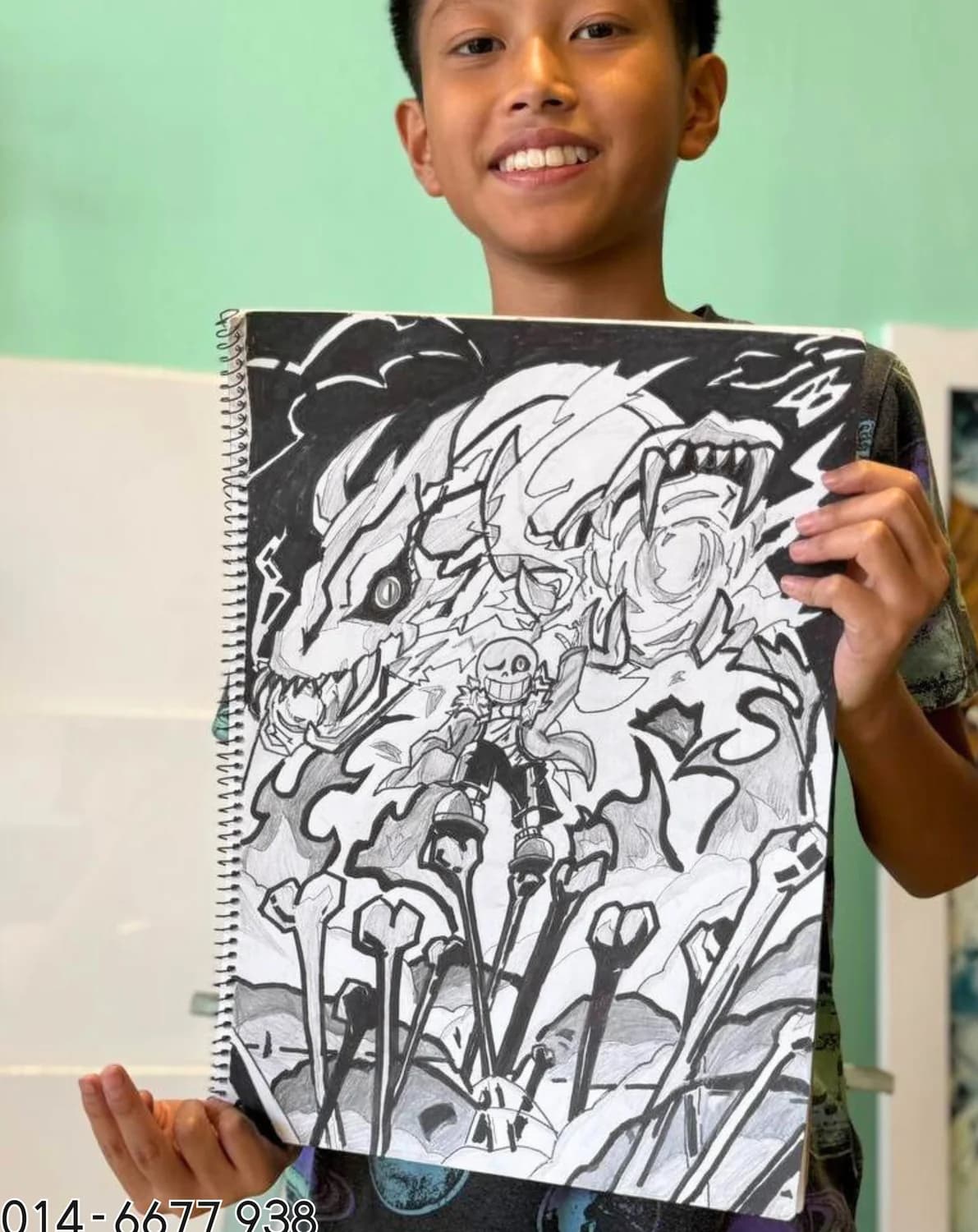 Boy presenting black and white fantasy drawing from Rycca art class