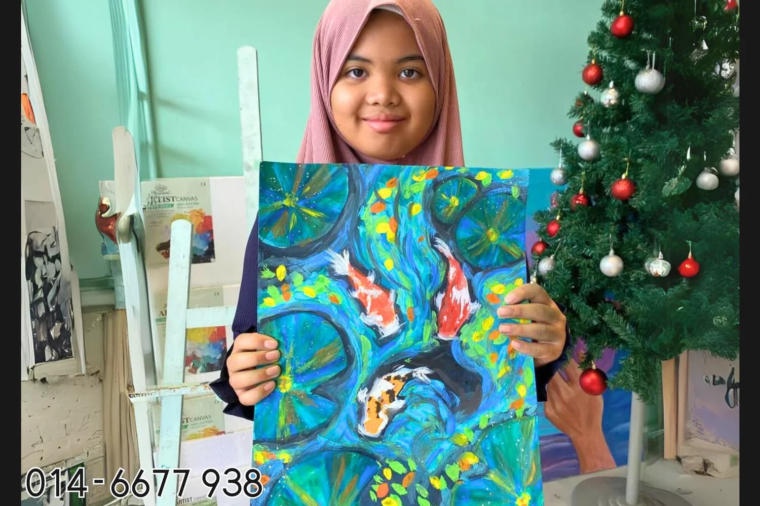 Girl holding nature bird painting from Rycca creative painting class